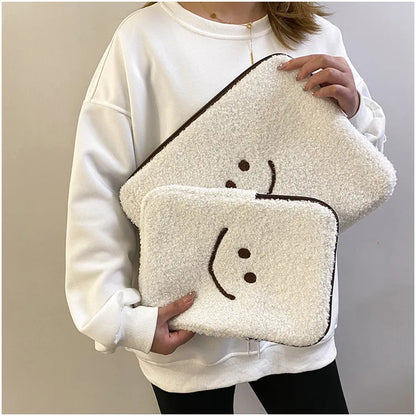 Housse tablette / ordinateur en peluche