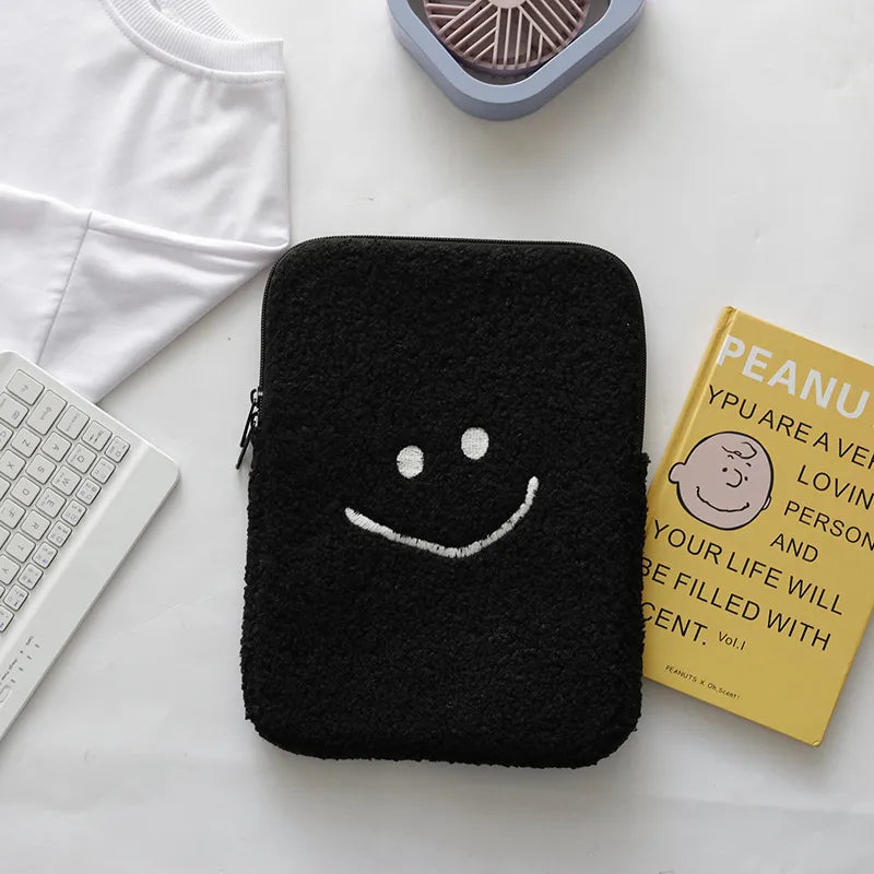 Housse tablette / ordinateur en peluche