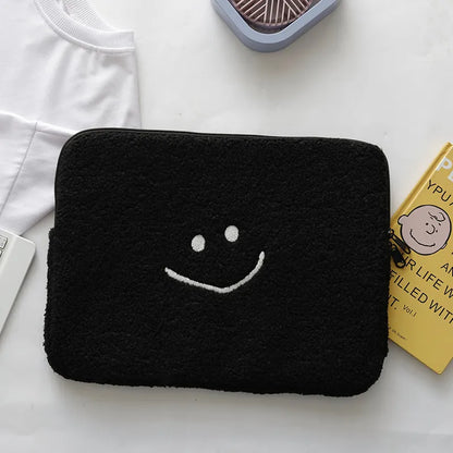 Housse tablette / ordinateur en peluche