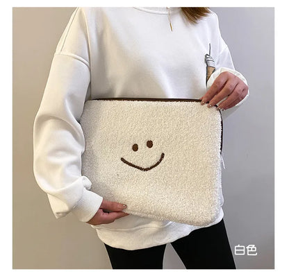 Housse tablette / ordinateur en peluche