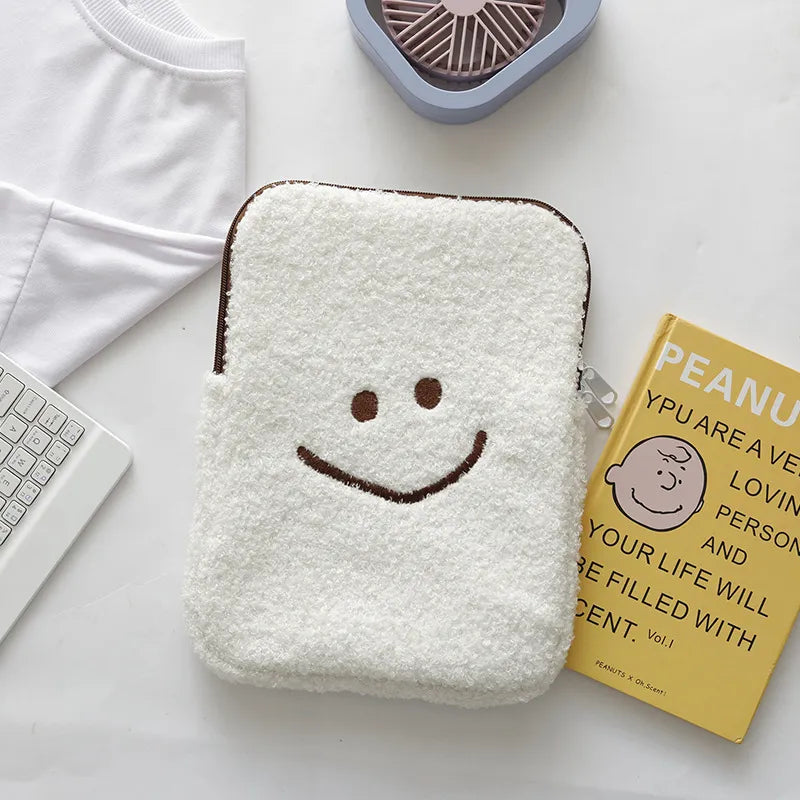 Housse tablette / ordinateur en peluche