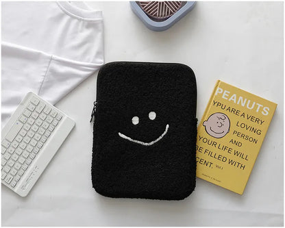 Housse tablette / ordinateur en peluche