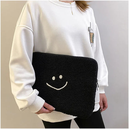 Housse tablette / ordinateur en peluche