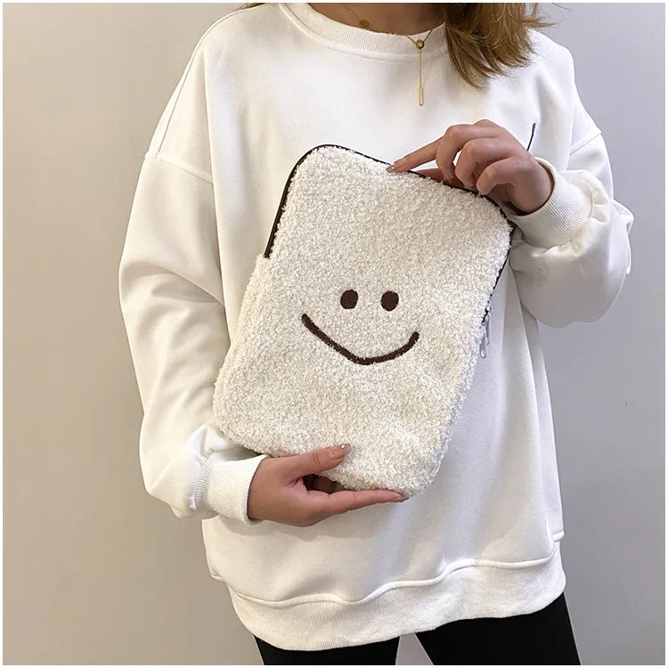 Housse tablette / ordinateur en peluche